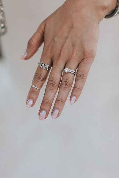 brides wedding ring and nails