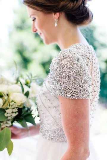 wedding gown with beaded bodice and sleeves