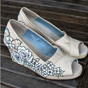 Who is wearing wedges?