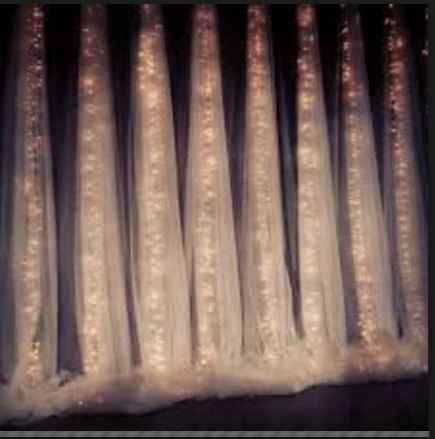 DIY Tulle, Light and Greenery Backdrop