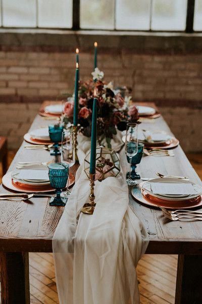 Maybe teal candles to tie it all in, but eucalyptus runners on the tables