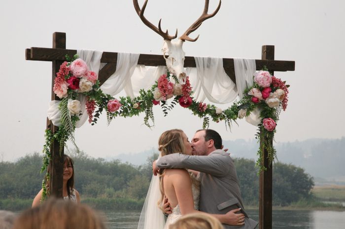 Arch. That's the elk that SHE got last year. They put it up at the reception last year beside his ti
