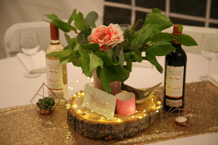 A little sparkle with succulents that we inside rose gold terrariums. They were gold but we spray pa
