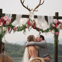 Arch. That's the elk that SHE got last year. They put it up at the reception last year beside his ti