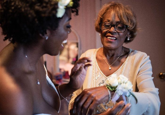 me and my mom putting on her corsage