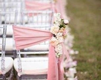 How to keep organza chair sashes from slipping down plastic chairs. 2