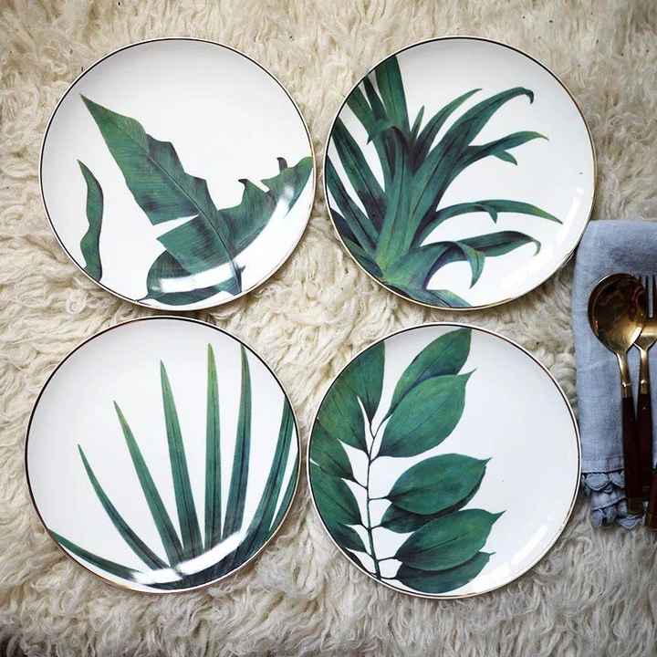My favorite plates; I have found mini golden easels to display these upward since my wedding is in a