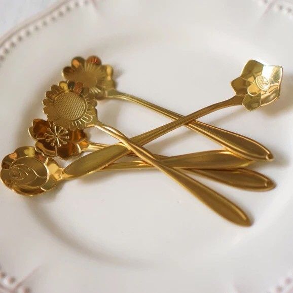 these dessert spoons are too cute; just have to buy them; will probably put them next to the wedding