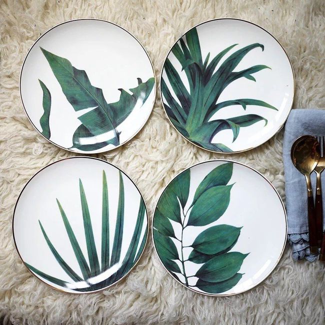My favorite plates; I have found mini golden easels to display these upward since my wedding is in a