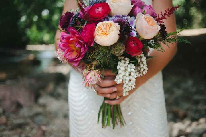 I love this bouquet with pretty reds and cream colors