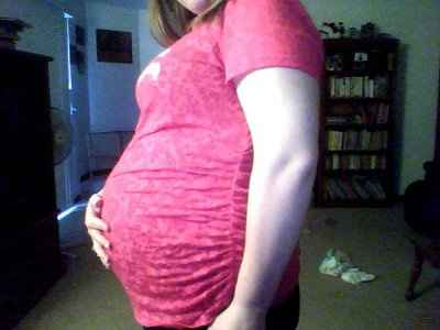 21 weeks and YES it really was me (my bump!) in that dress!! lol