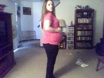 21 weeks and YES it really was me (my bump!) in that dress!! lol