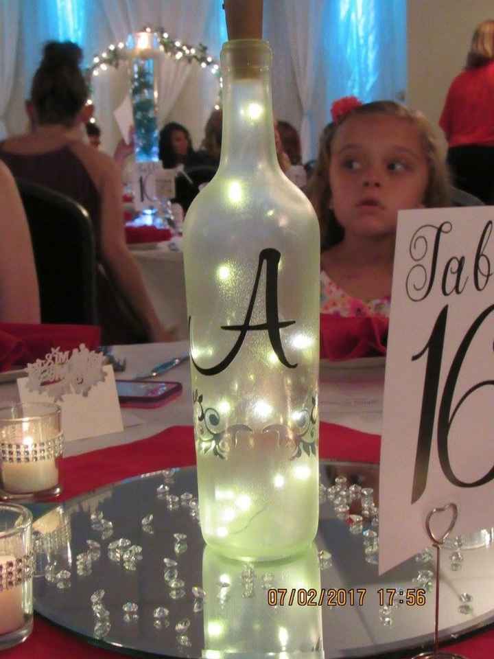 Wine bottle on every other table at our reception 