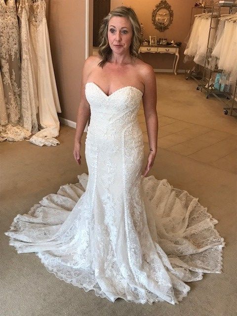 How much was your wedding dress? 1