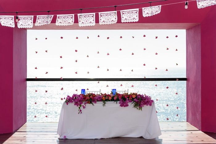 Sweetheart table with carnation curtain.