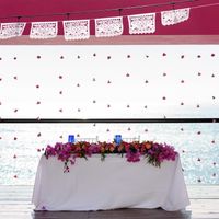 Sweetheart table with carnation curtain.