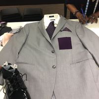 What does the father of the groom wear? - 1