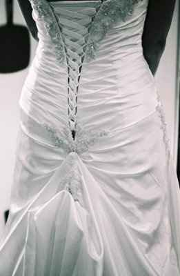 Strings From a Lace Up Back - Sq Knot and Brooche - Thoughts Hayley(others too) - Pics