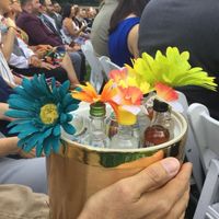 Instead of a typical flower girl, we had a 40yo friend hand out buckets with airline bottles of booz