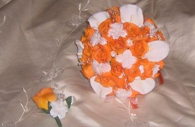 what flowers for black bridesmaids dresses with orange shawls?