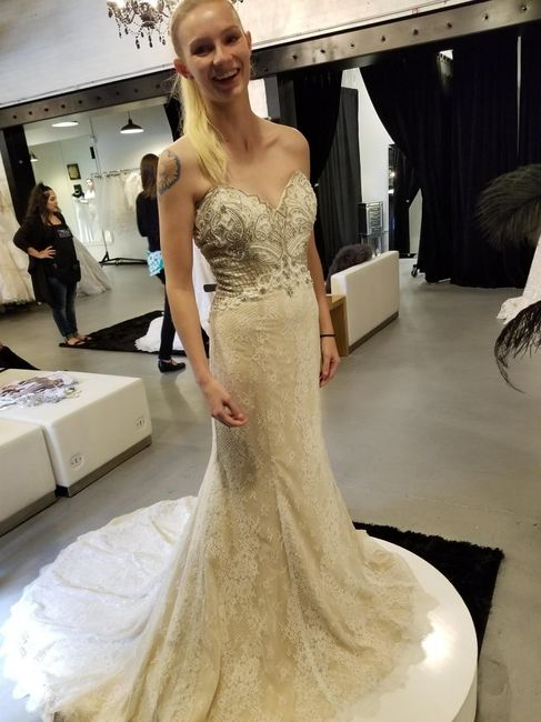 Who is your wedding dress designer? 1