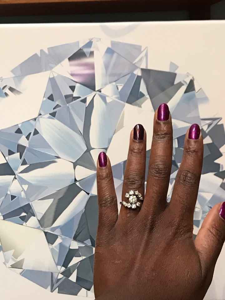 You can see the facet shape of this cut of diamond in the painting behind my hand 