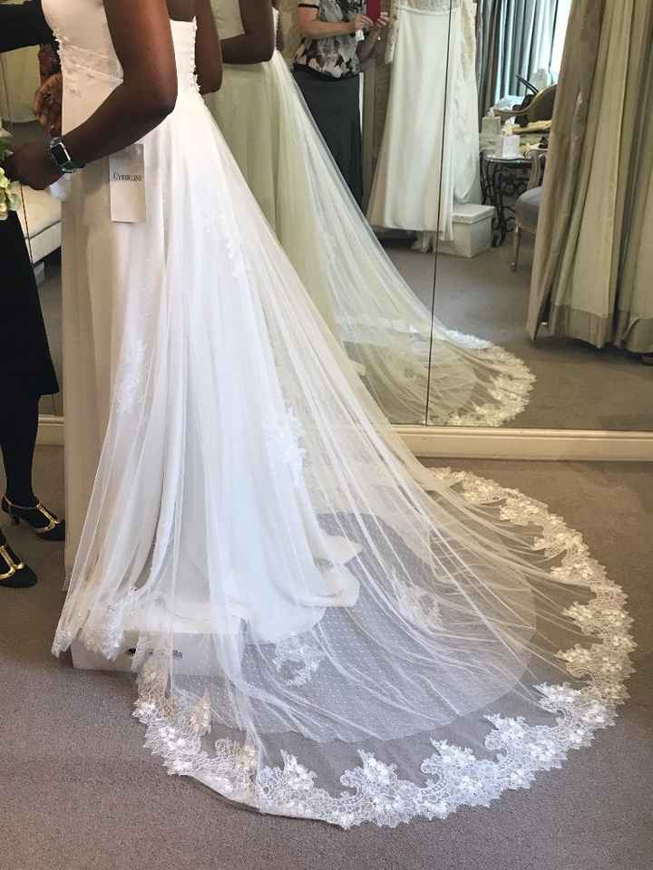 Love a lace train: its real Chantilly lace with hand beaded Appliqué flowers. I will add Swarovski c