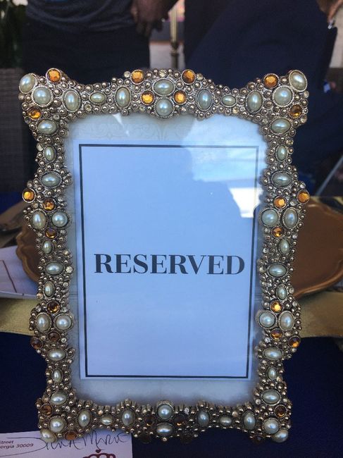 blinged out frame to double as table numbers
