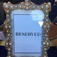 blinged out frame to double as table numbers