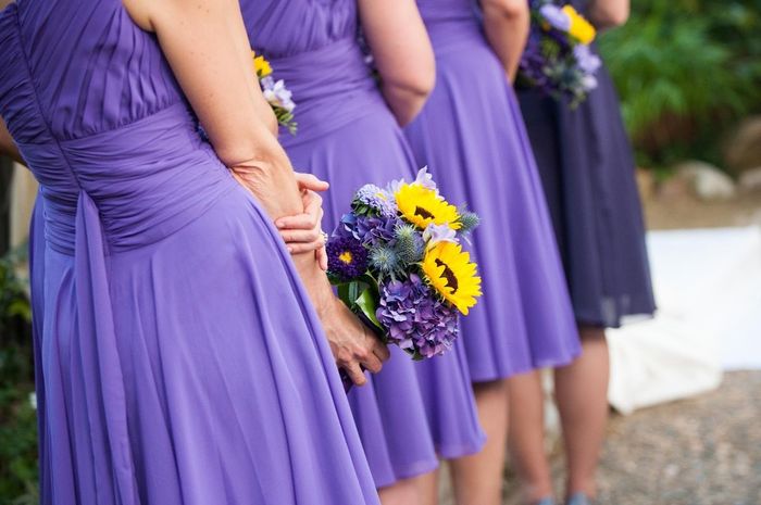 Sunflower bouquets with BM's purple dresses?