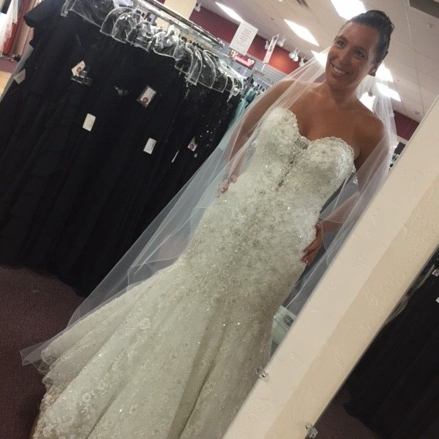 Show me your wedding dresses, and tell me where they are from,and the cost? :)