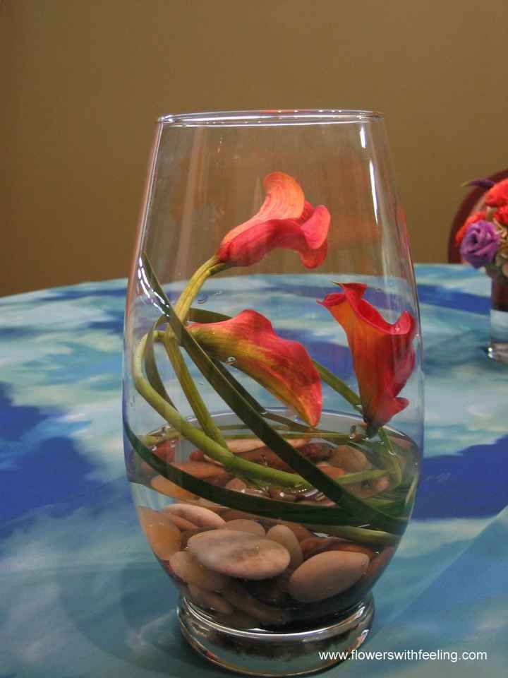 Ideas for centrepieces in hurricane vases? Non-floral? Aqua & white garden party!