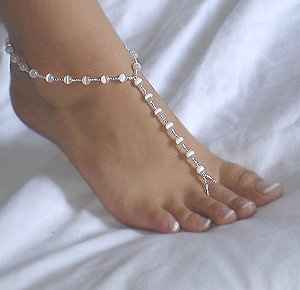 Having a beach wedding- should I walk barefoot or in sandles