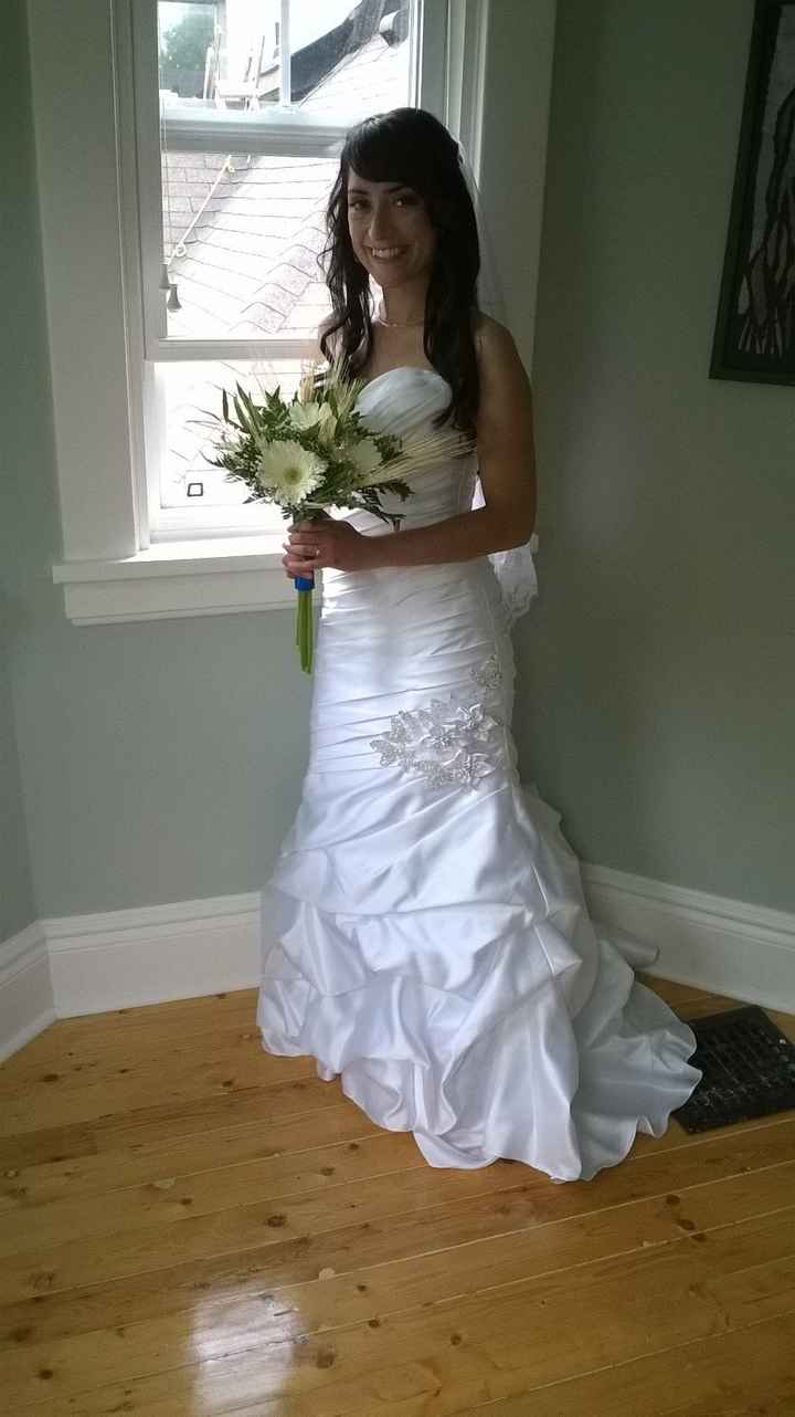 Brides with form fitting dresses