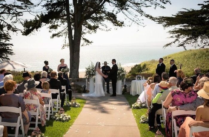 Can I see pics of your aisle/ceremony decor and wedding arbors?