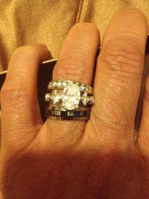 Guess what we bought/show off your wedding bands!