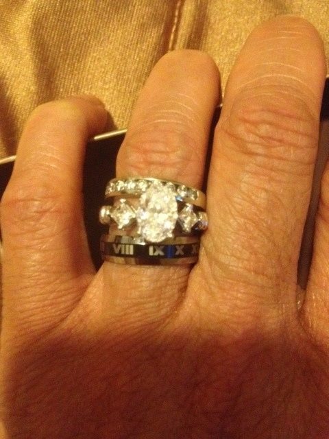 Guess what we bought/show off your wedding bands!