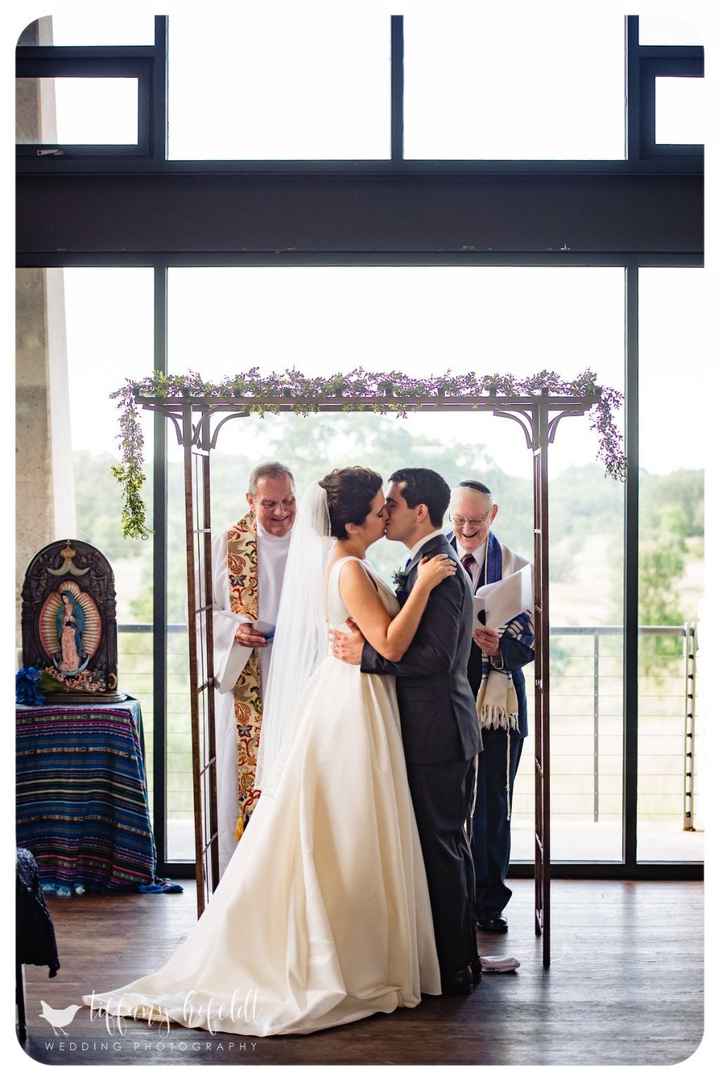 He said "you may now kiss each other" which I really liked as opposed to "the bride"