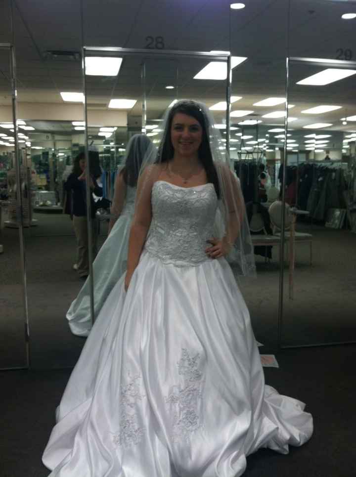 Getting train taken off of dress...