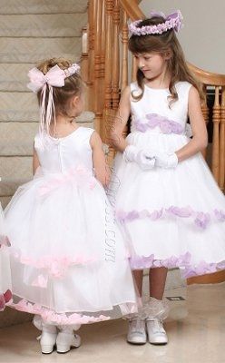 If you still looking for you FG dress please check this site out!!!! I have petals in mines:) must s