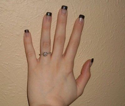 23 small diamonds, and one bigger diamond... I LOVE IT. Lets see some rings my fellow brides.