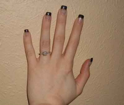 23 small diamonds, and one bigger diamond... I LOVE IT. Lets see some rings my fellow brides.