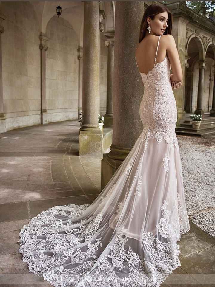 Anyone have a David Tutera dress?