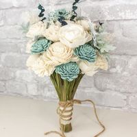 Anyone else using fake flowers on their bouquets? - 1