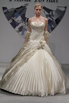If you had an unlimited budget, What is your dream wedding dress ?