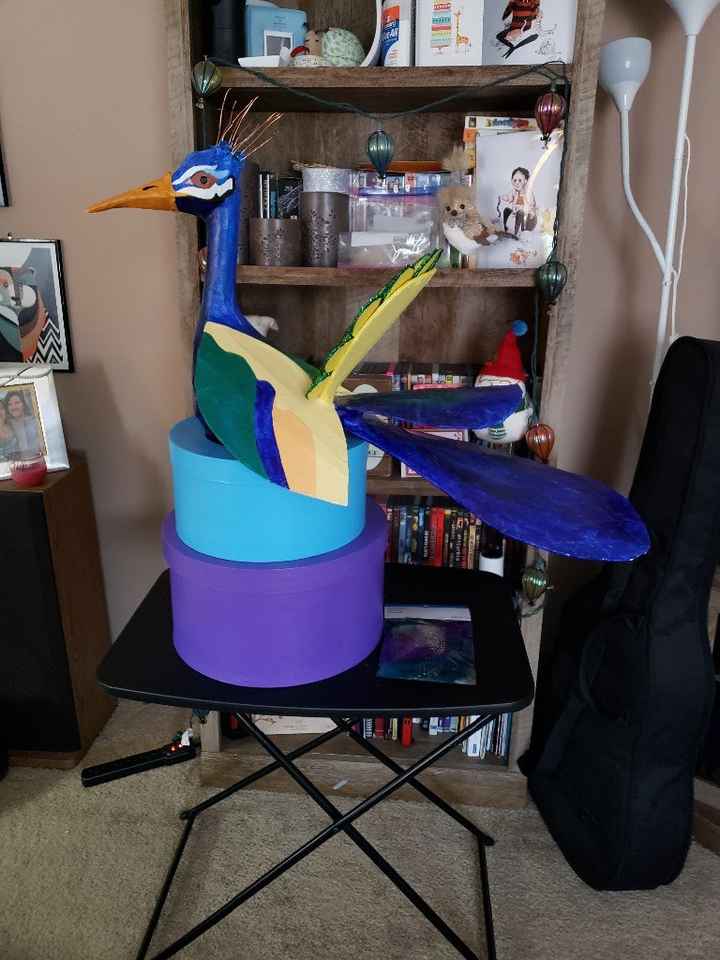 Peacock with 2 tiers. 