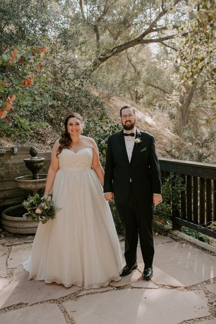Who is your wedding dress designer? 1