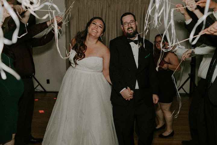 Our grand exit out into the rain; the ribbon wands were a great choice! (Photo by Katie Ruther)