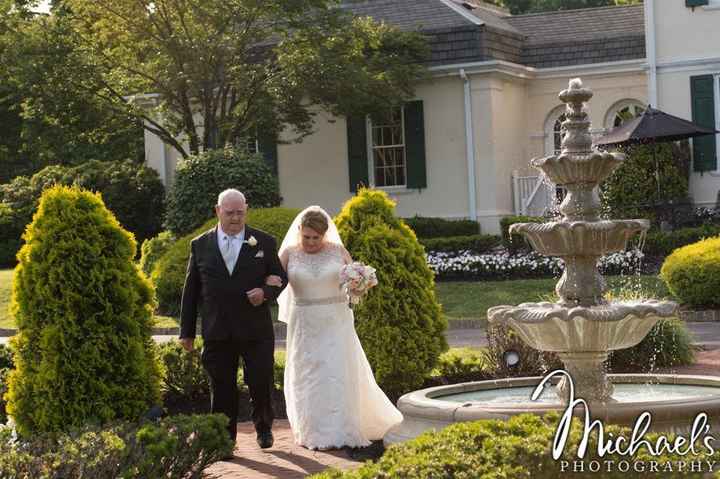 Me and my dad. He has a bad hip and wasn't sure if he'd be able to walk me down the aisle, but he di