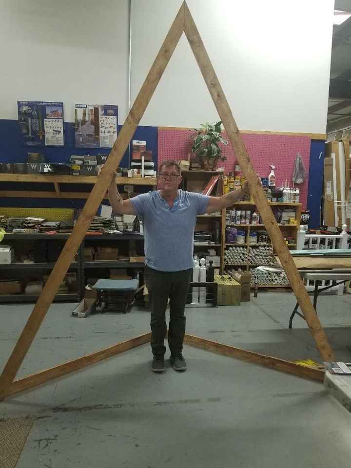 My Dad! And the Arbor he built! He was holding it up to send me a picture of the color! haha Cant wa